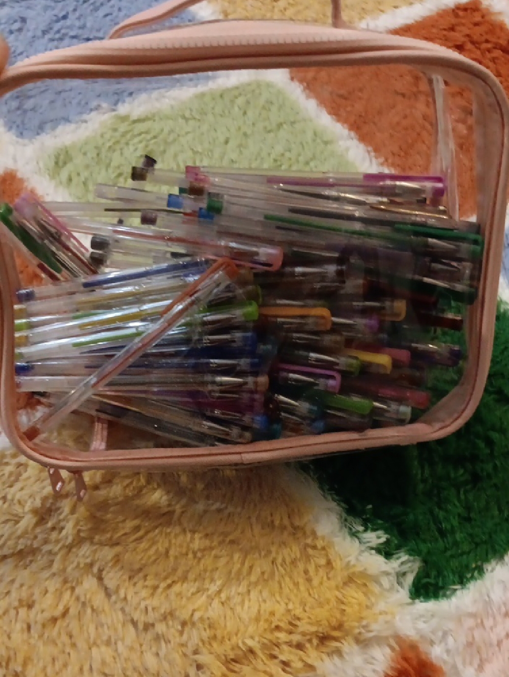 Clear Pink Cosmetic Bag Filled with Multicolor Gel Pens
